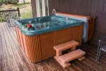 Ma Cook Lodge has a hot tub on the lower deck overlooking Norris Lake